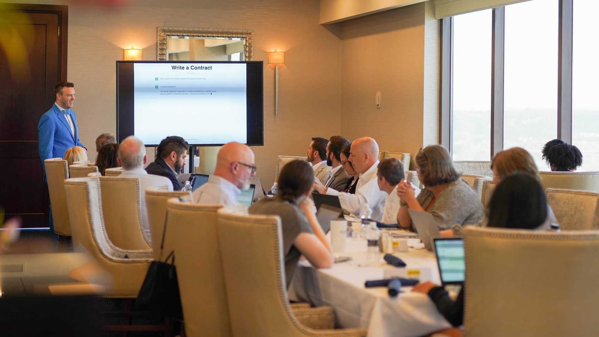 People listening to a presentation at a workshop event at the Metropolitan Club